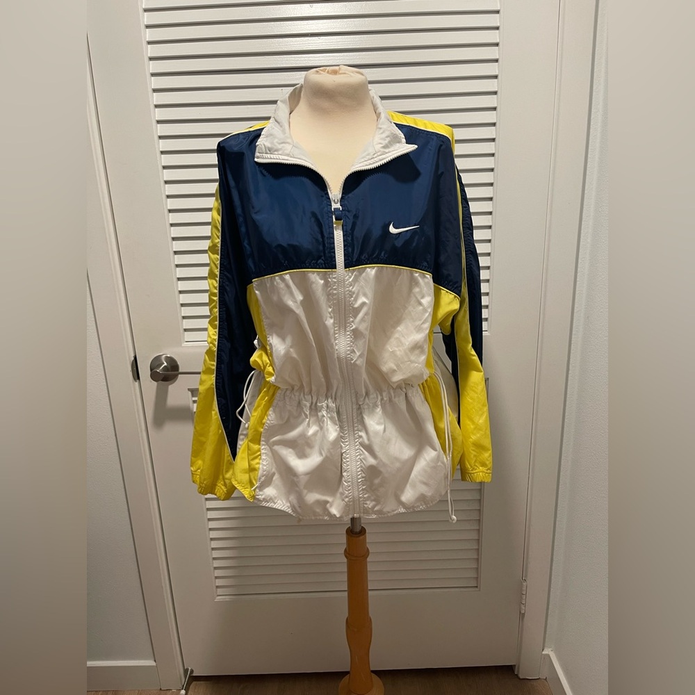 Vintage navy blue and yellow Nike windbreaker